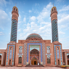 Goy Imam Mosque with its twin minarets and detailed mosaics graces a clear blue sky in Ganja,...