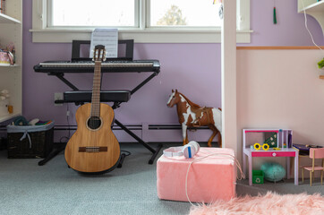 Child musician Bedroom in home with guitar and Keyboard