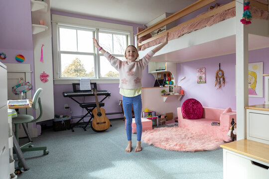 Cofident Young girl portrait in her Bedroom decor