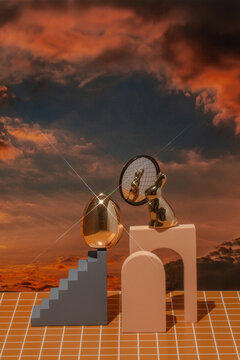 Conceptual still life with an Easter bunny and a mirrored egg at dawn