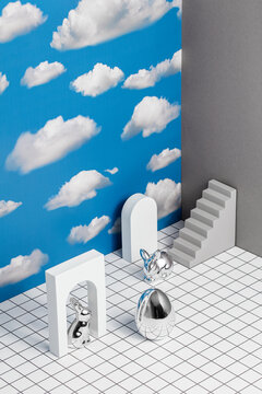 Conceptual 3d still life with Easter bunnies and a mirrored egg
