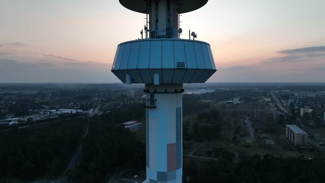 Drone shot of a tower in Cottbus during the sunset.