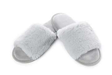 Pair of soft slippers with fur isolated on white