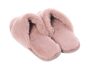 Pair of pink soft slippers isolated on white