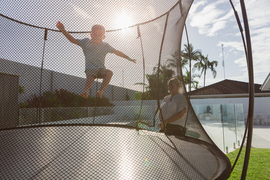 Flying action leap on a trampoline