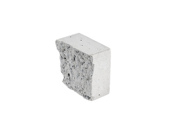 Broken cement cube shape damage from compression test strength on white isolated background