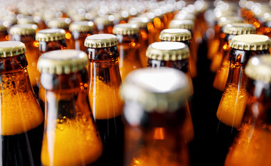 Mass Product of Beer Bottles, Rows of glass production alcohol on industrial conveyor belt