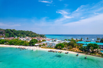 Aerial view landscape longtail boat on Phi Phi island from drone, travel landmark of Thailand