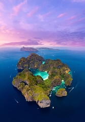 Aerial top view sunset Maya Bay in island Phi Phi Leh, turquoise clear water in Krabi Thailand....