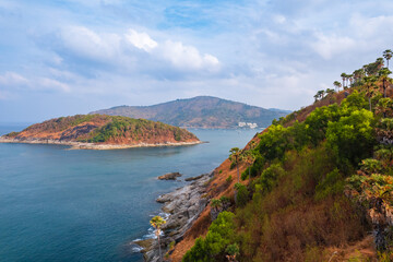 Obraz premium Viewpoint Promthep Cape of Phuket, Amazing aerial view above Nai Harn beach, Thailand travel