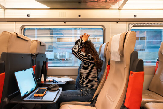 Pregnant woman traveling by train
