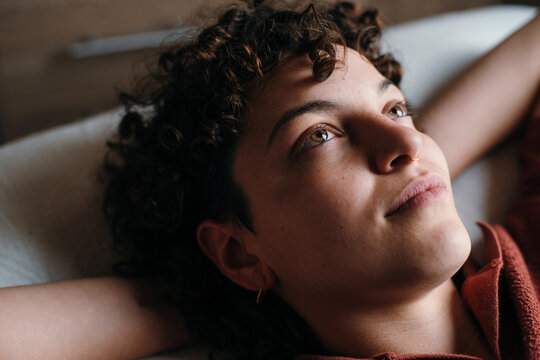 Daydreaming woman with beautiful eyes portrait