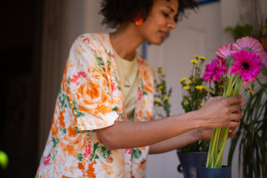 Candid portrait with flowers at home