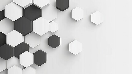   A black and white hexagonal mosaic on a white wall with a monochromatic color palette