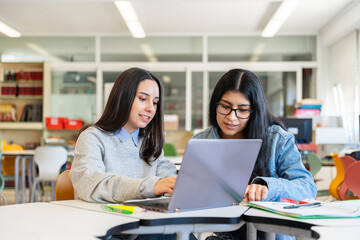 Focused Study Session with laptop in a library