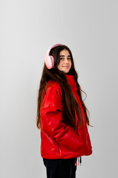 Smiling Teen with Pink Headphones