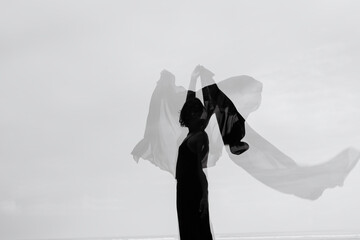 Abstract female dance on beach in sunrise