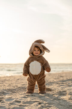 A toddler with a bunny onesie