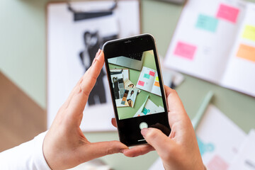 Designer Capturing Ideas on Smartphone