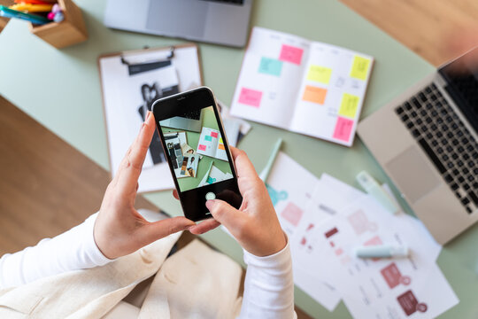 Designer Capturing Ideas on Smartphone