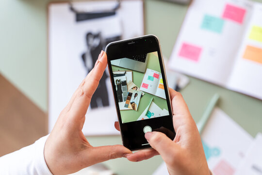 Designer Capturing Ideas on Smartphone
