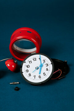 red alarm clock disassembled