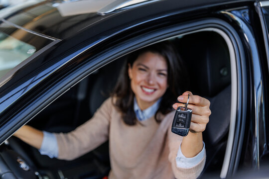 Woman showing off new car keys