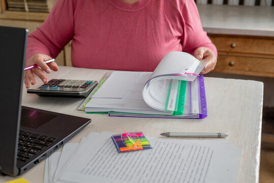 Accountant counts on a calculator