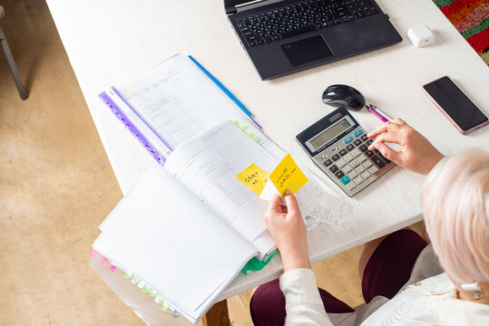 Accountant counts on a calculator