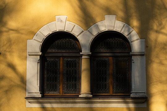 Two old window in house in mountains.

