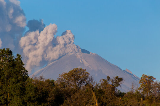 Sunrise with Popocatepetl active.