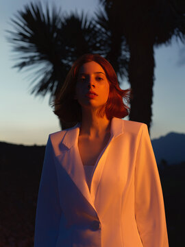 Colorful fashion portrait under the sunset