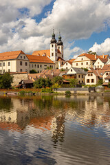 Telc town - historical buildings with lake on foreground