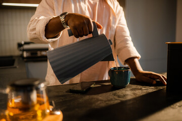 A man makes tea