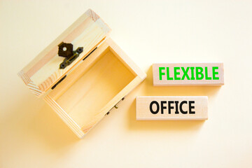 Flexible office symbol. Concept words Flexible office on beautiful wooden block. Beautiful white paper background. Empty wooden chest. Business Flexible office concept. Copy space.