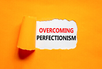 Overcoming perfectionism symbol. Concept words Overcoming perfectionism on beautiful white paper....