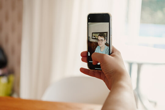 teenager taking a selfie