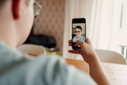 teenager taking a selfie