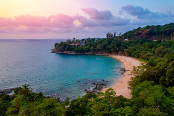 Aerial top view panorama sunset Laem Sing beach with sea of Phuket paradise. Concept tropical...