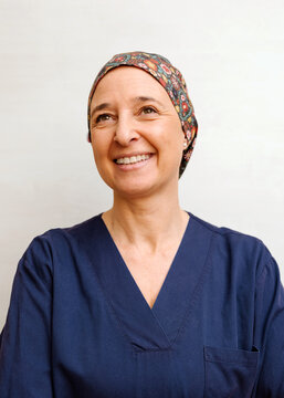Mature healthcare professional with a compassionate smile