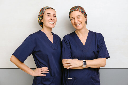 Smiling Medical Professionals In Scrubs