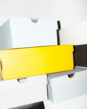 Colourful cardboard boxes and packaging material with hard flashlight