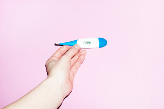 Photo of clinical thermometer with fever sick/ill celcius degrees 