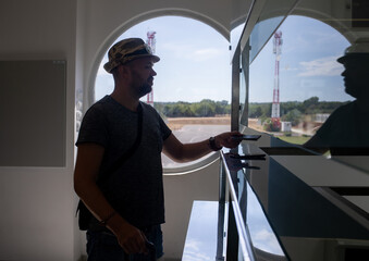 Traveler Handing Passport at Airport