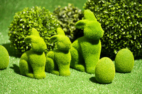 Green grass rabbits and eggs. Easter concept. 