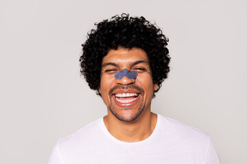 Joyful Man with Nose Patch