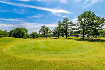 Obraz premium Golf Course Club Green on Sunny Summer Day