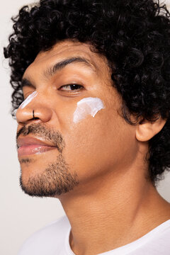 Close-up of Man with Moisturizer