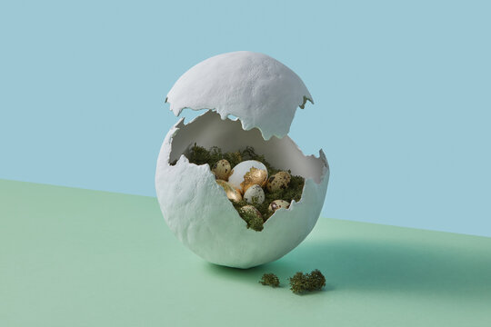 Cracked open egg shell composition in religious holiday theme
