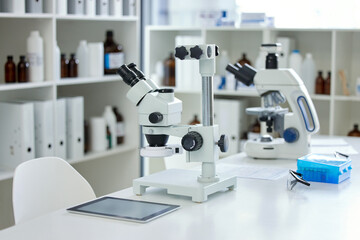 Microscope, empty laboratory and science with DNA for blood test, hair or tissue sample. Forensics, biology and equipment with tablet for genetic identification, analysis or research investigation